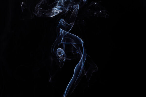 White abstract smoke on a black background