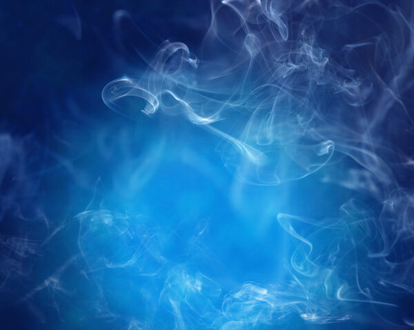 White abstract smoke over a blue background