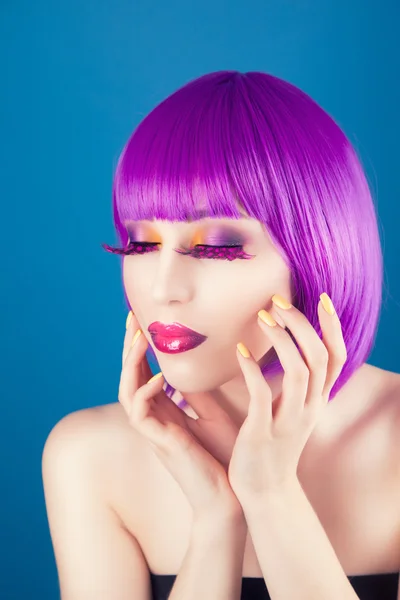 Beautiful woman wearing colorful wig — Stock Photo, Image