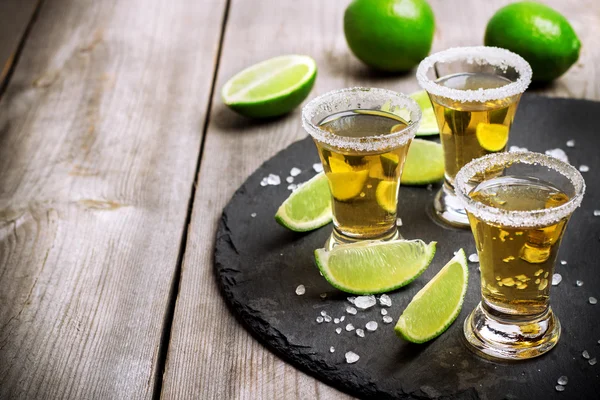 Gold mexican tequila shot — Stock Photo, Image