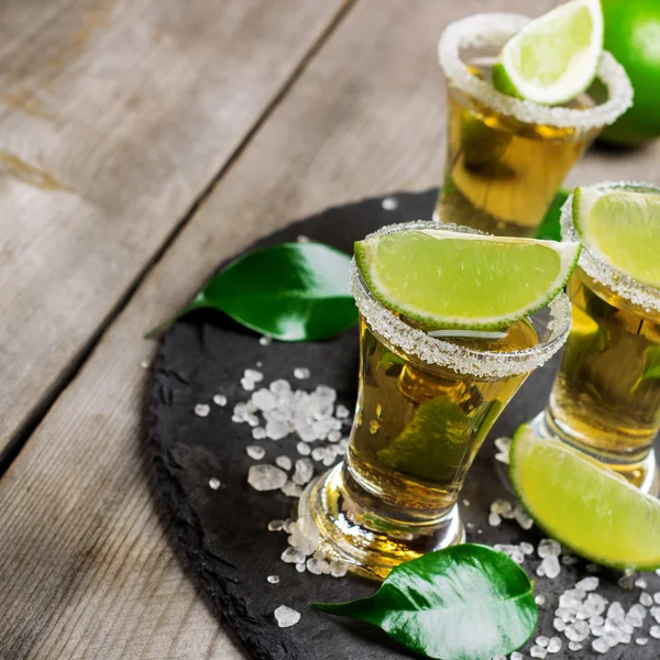 Gold mexican tequila shot — Stock Photo, Image