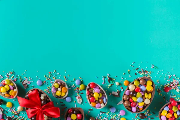 Easter Frame Chocolate Eggs Sweets Turquoise Green Blue Background Copy — Stock Photo, Image