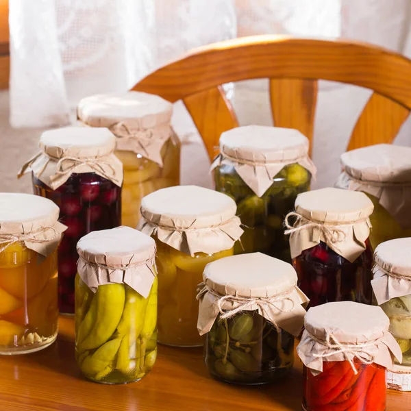 Homemade preserved, fermented food, pickled, marinated vegetables, fruit compote — Stock Photo, Image