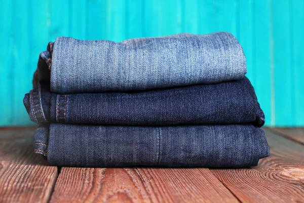 Stack of blue and dark blue jeans — Stock Photo, Image