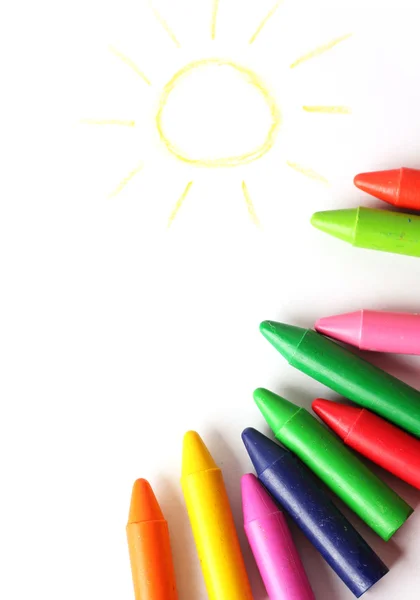 Oil pastel crayons lying on a paper — Stock Photo, Image