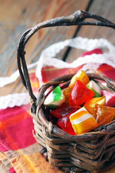 Basket with colorful sweet candies — Stock Photo, Image