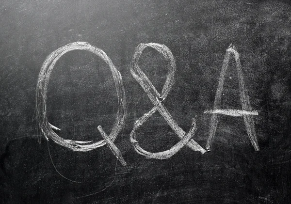 Questions and answers on a black chalkboard — Stock Photo, Image