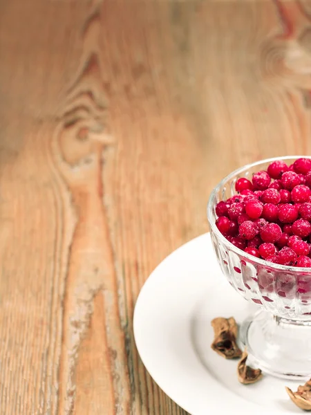 Frozen red currant berries in a glass bowl — Stock Photo, Image