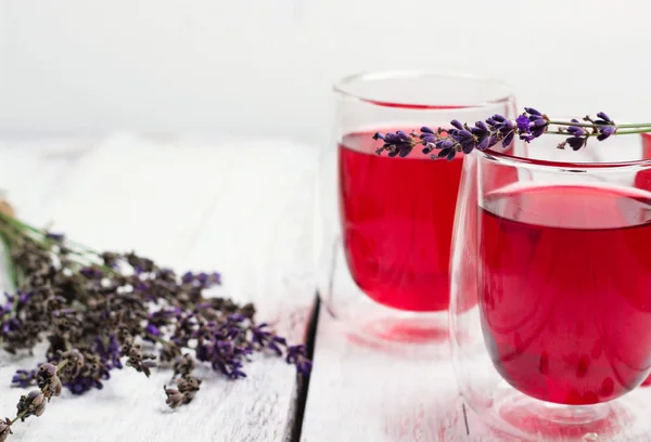 Cranberry (red berries) drink in glass — Stock Photo, Image