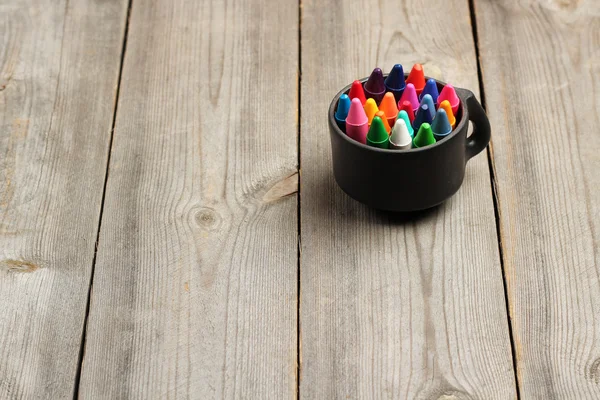 Crayons (pencils) on a wooden table — 스톡 사진