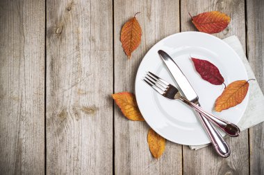 Table setting on a rustic wooden table