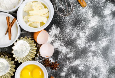Baking background with sugar, flour, eggs, butter, spices