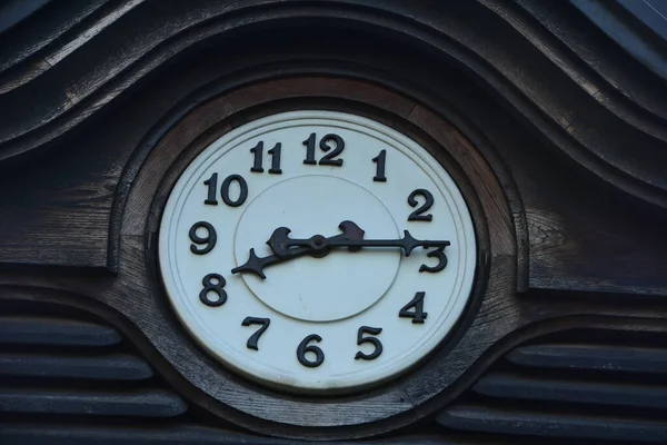 Image of spring Time Change. Summer back concept. Vintage alarm Clock outdoors.Daylight Saving Time. Summer time change