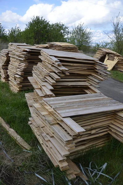 Close-up old wooden pallets.Wood pallet in factory area use for carry material and product supply to customers.Selective focus