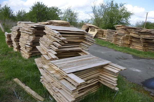 Close-up old wooden pallets.Wood pallet in factory area use for carry material and product supply to customers.Selective focus