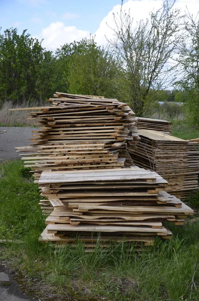 Close-up old wooden pallets.Wood pallet in factory area use for carry material and product supply to customers.Selective focus