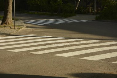crosswalk on the road for safety when people walking cross the street, Crosswalk on the street for safety, logistic import export and transport industry.Crosswalk in Black and white