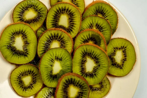 Plate Fresh Kiwi Fruits Cross Sections Wooden Table Copy Space — Photo