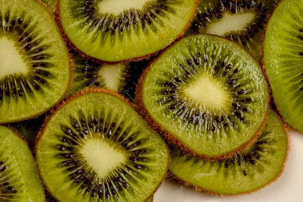 Plate Fresh Kiwi Fruits Cross Sections Wooden Table Copy Space — Fotografia de Stock