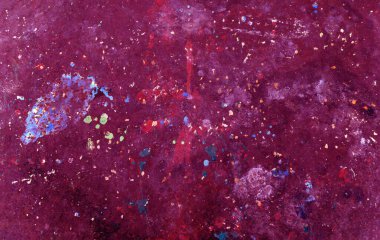 Eskimiş bir yüzeyde boya lekeleri ve lekeleri olan soyut bir arka plan. Tasarım, arkaplan, poster, kapak ve dijital projeler için sanatsal doku.