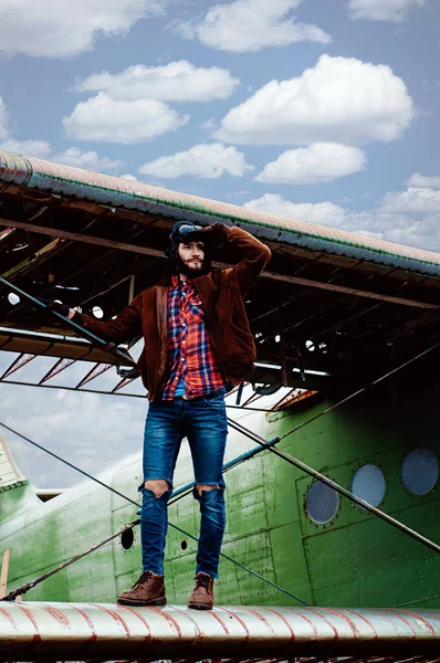 Bearded Young Pilot Stands Wing Old Plane Peers Distance — Stock Photo, Image