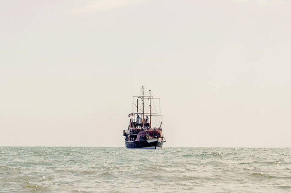 A strolling pirate ship in the sea
