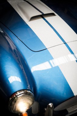 Headlight Detail of Blue Classic car clipart