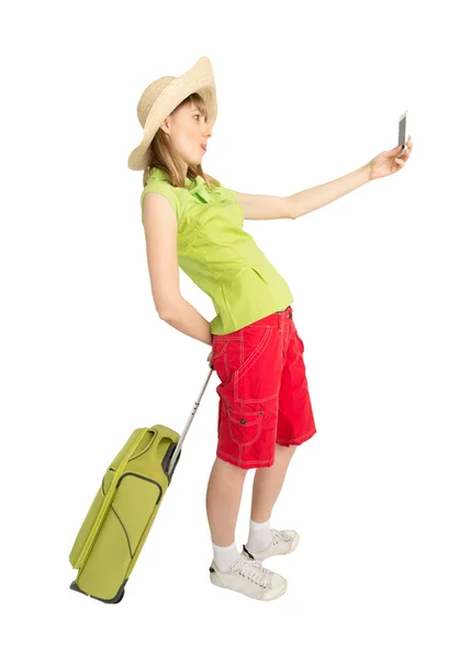 Turista com saco faz foto por telefone — Fotografia de Stock