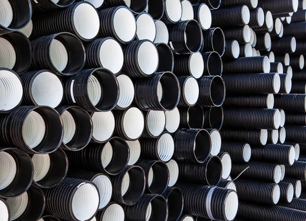 Black and white PVC pipes — Stock Photo, Image