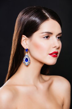 beautiful fashion model with perfect makeup wearing jewelry clipart