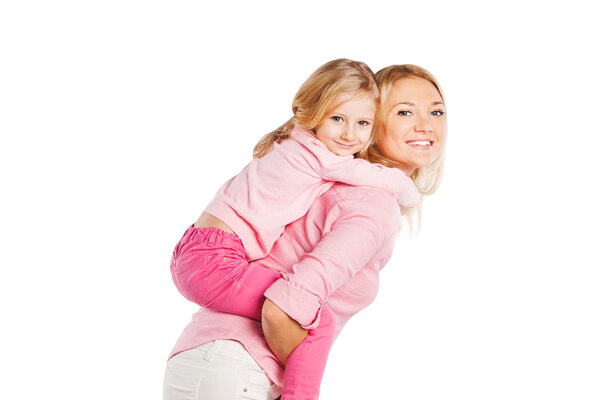 Closeup portrait of happy mother and little daughter - isolated. Happy family people concept.