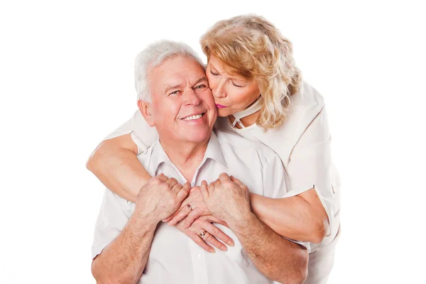 Happy smiling seniors couple in love. Isolated over white background Royalty Free Stock Images