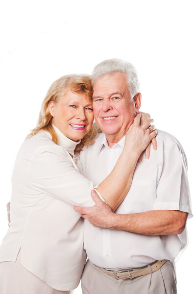 Happy smiling senior loving couple over white background