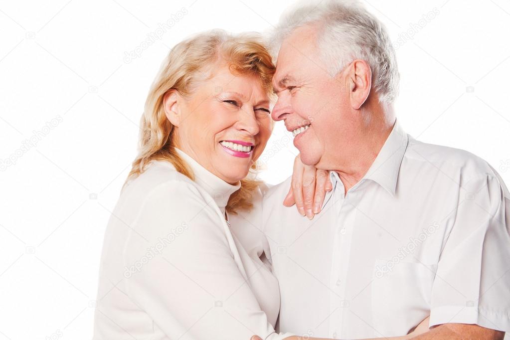 Happy smiling senior couple in love. Isolated on white background.