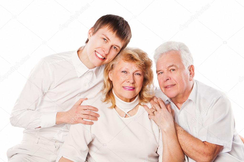 Happy smiling family. Elderly parents with son. Isolated on white background.