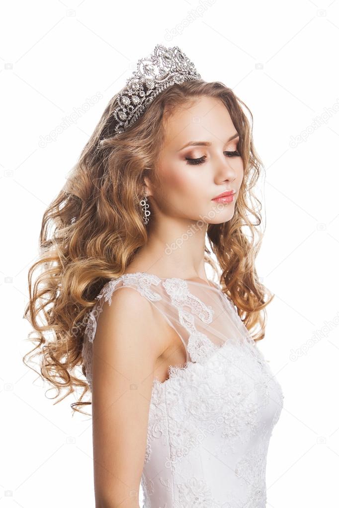 Beauty woman with wedding hairstyle and makeup.