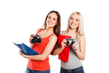 İki kız öğrenci photocamera ile. Öğrenciler kavram. Beyaz izole