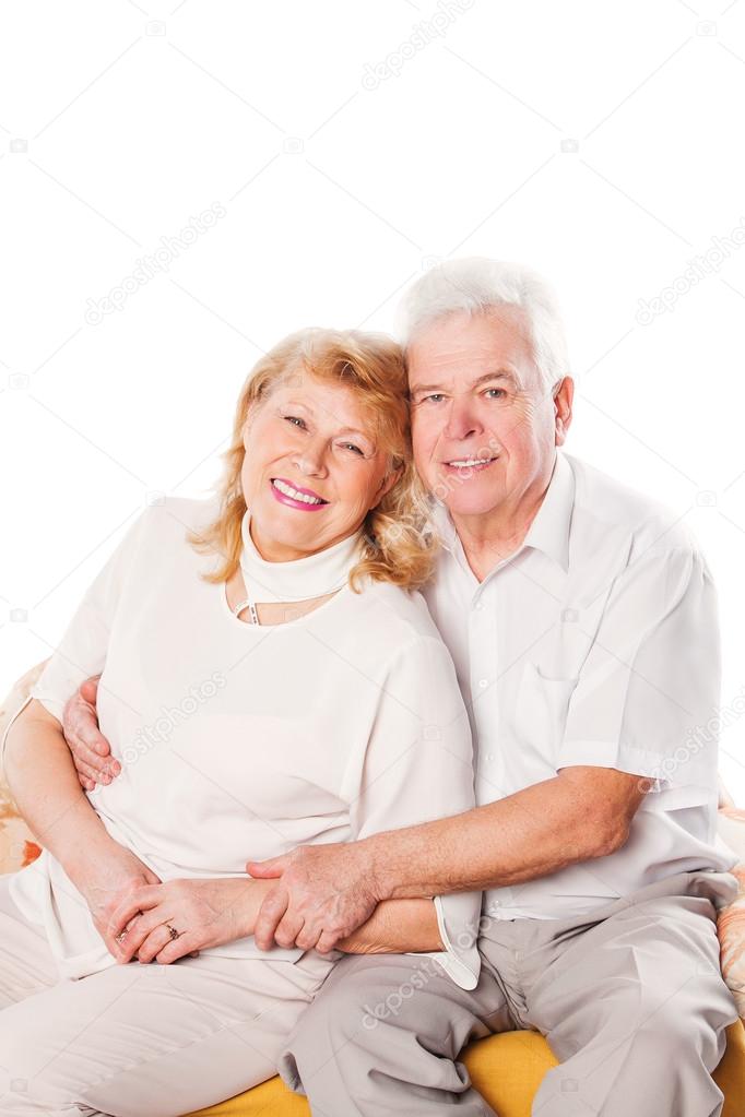 Happy senior couple in love. Isolated over white background.
