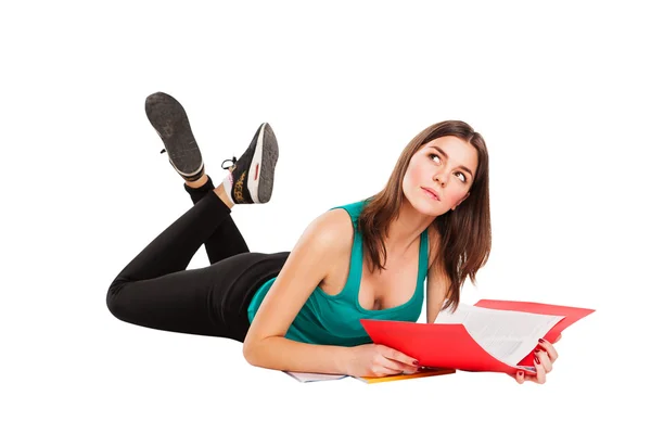 Isolated student lie on the floor with book, dreaming. — Stock Photo, Image