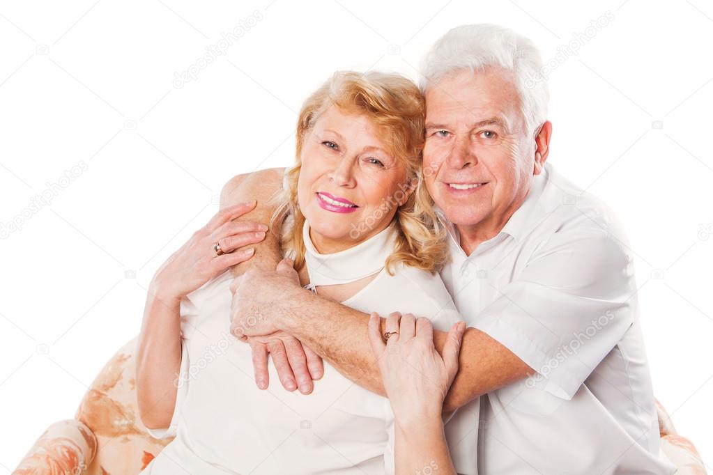 Happy senior couple in love. Isolated on white.