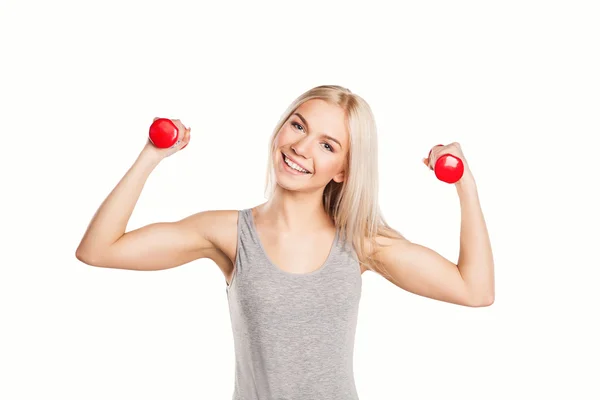 Mujer haciendo ejercicio con pesas — Foto de Stock