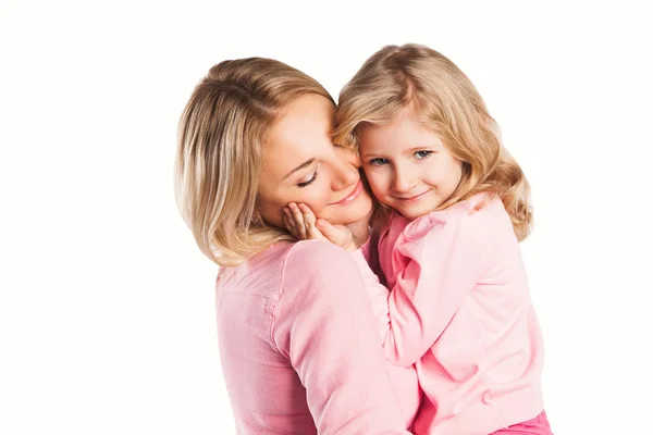 Portrait of happy embracing mother and daughter — Stock Photo, Image