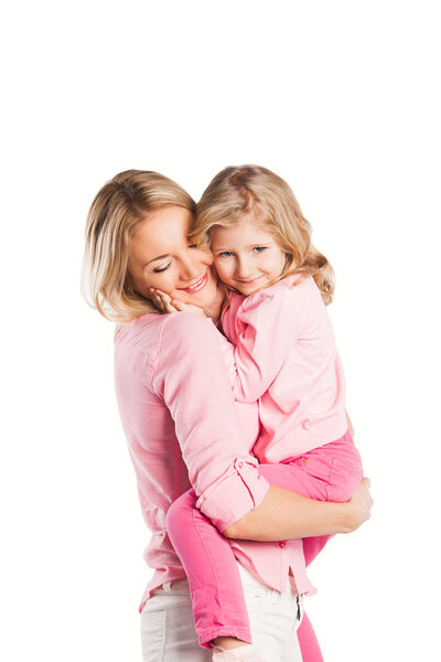 Portrait of happy embracing mother and daughter