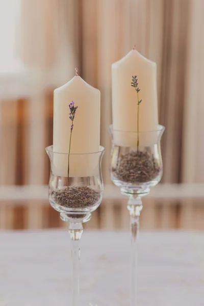 White wedding candles with beautiful lavanda flowers — Stock Photo, Image