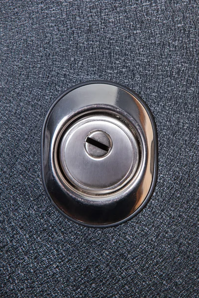 Close up of keyhole in round lock, safety concept. Door element — Stock Photo, Image