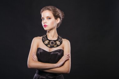 portrait of a beautiful fashion model with gorgeous luxury necklace.  clipart