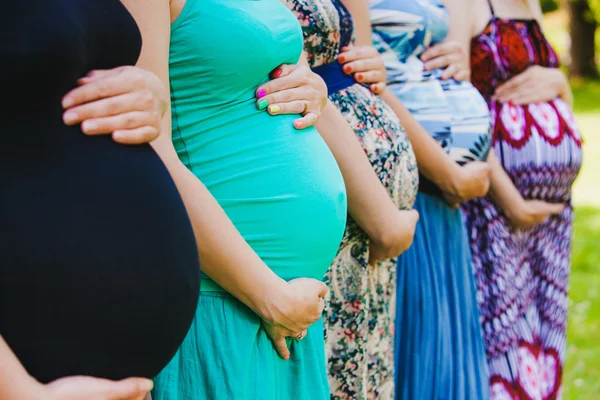 Closeup of group pregnant bellies. — Stock Photo, Image