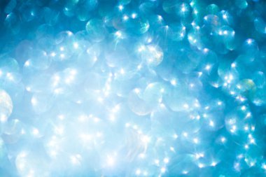 Zarif mavi arka plan ile bokeh ışıklar defocused