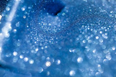 Parlak mavi glitter bokeh arka plan bulanıklık. 