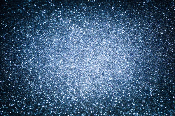 Blue shiny glitter background